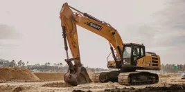 A tractor digging is standing on its stabilisers, not on its wheels